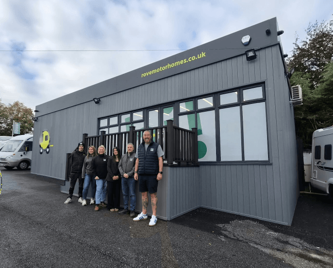 The Rove Motorhomes team stands outside its Mansfield sales office.
